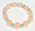 *12mm Iridescent Orange Beads with 8mm Light Green Faceted Beaded Bracelet