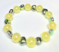 *12mm Iridescent Yellow Beads with Green Heart Glass Beaded Bracelet