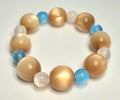 *16mm Tan Cat Eye Resin Beads With 8mm Blue & White Cat Eye Beaded Bracelet