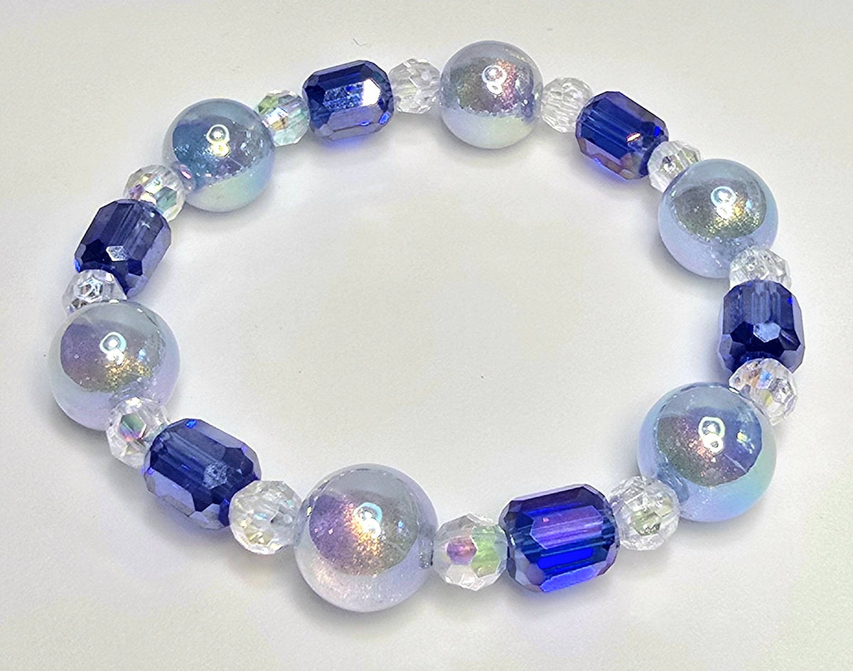 *12mm Iridescent Blue Beads With 10mm Cobalt Blue Barrel Bead & 6mm Clear Beaded Bracelet